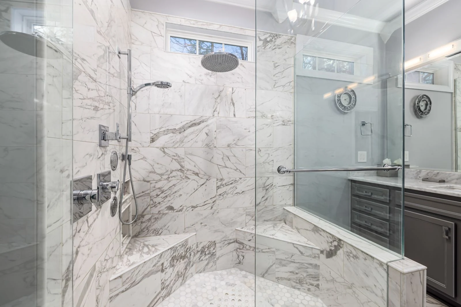 Elegant marble bathroom with contemporary design and glass shower