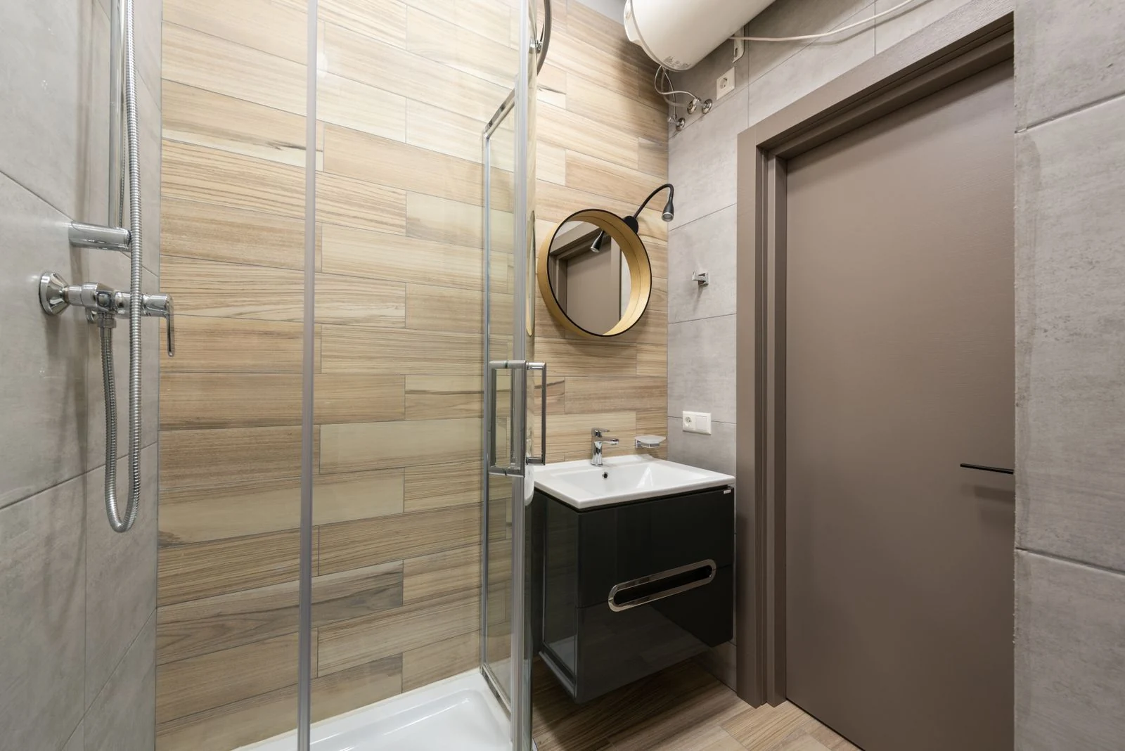 Compact bathroom with a vanity and shower